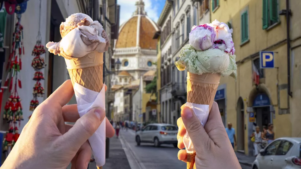 eating ice cream together in Florence Italy.