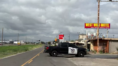 Law enforcement responds to an active shooting scene Friday, June 12, 2026, in Midland, Texas. (Luke Dias/Reporter-Telegram via AP)