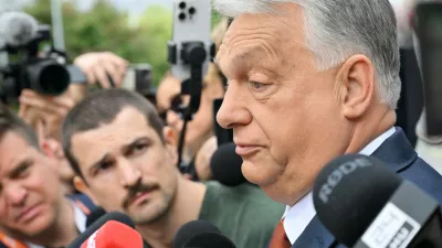 Fidesz party head and former prime minister Viktor Orban, center, speaks to the press as he arrives at the opposition Fidesz party's working congress meeting, in Budapest, Hungary, Saturday, June 13, 2026. (Zoltan Mathe/MTI via AP)