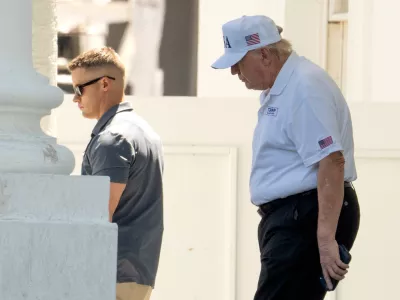President Donald Trump walks to board his limousine at the North Portico of the White House, Saturday, June 13, 2026, in Washington. (AP Photo/Mark Schiefelbein)