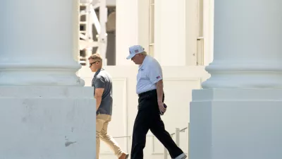 President Donald Trump walks to board his limousine at the North Portico of the White House, Saturday, June 13, 2026, in Washington. (AP Photo/Mark Schiefelbein)