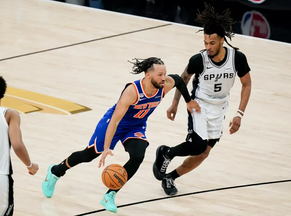 Jun 13, 2026; San Antonio, Texas, USA; New York Knicks guard Jalen Brunson (11) dribbles against San Antonio Spurs guard Stephon Castle (5) in the second half during game five of the 2026 NBA Finals at Frost Bank Center. Mandatory Credit: Dustin Safranek-Imagn Images