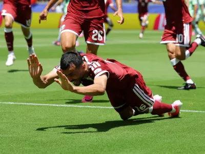 Soccer Football - FIFA World Cup 2026 - Group B - Qatar v Switzerland - San Francisco Bay Area Stadium, Santa Clara, California, U.S. - June 13, 2026 Qatar's Boualem Khoukhi celebrates scoring their first goal REUTERS/Carlos Barria   TPX IMAGES OF THE DAY