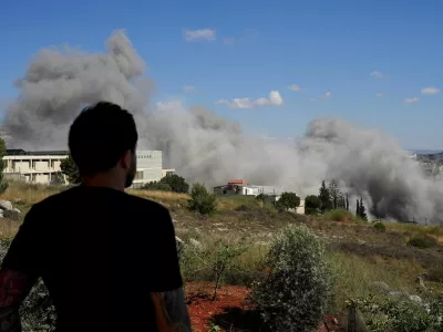 Smoke billows from southern Lebanon following an Israeli strike, as seen from Nabatieh, Lebanon, June 13, 2026. REUTERS/Stringer