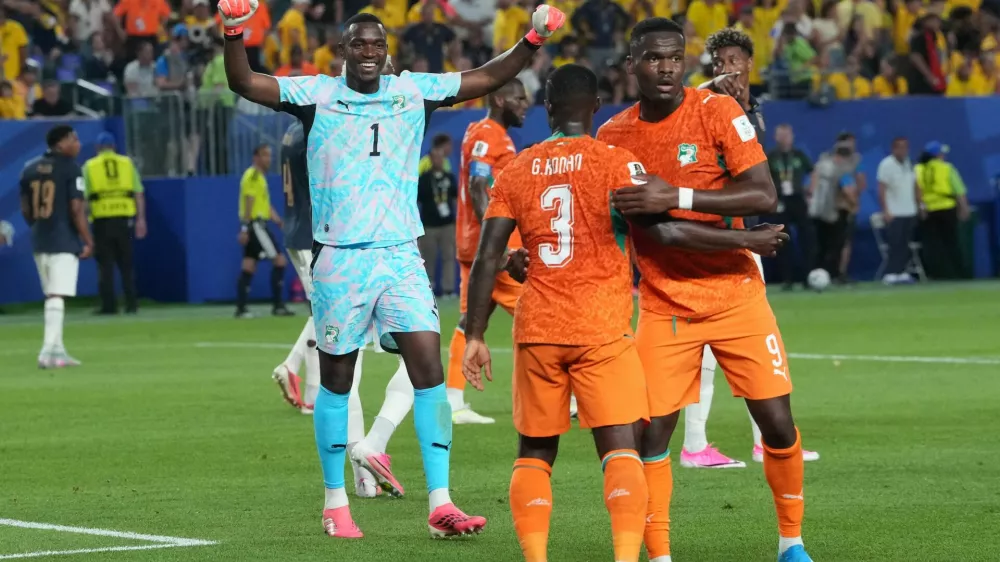 Soccer Football - FIFA World Cup 2026 - Group E - Ivory Coast v Ecuador - Philadelphia Stadium, Philadelphia, Pennsylvania, U.S. - June 14, 2026 Ivory Coast's Yahia Fofana celebrates with Ange Bonny and Ghislain Konan after the match IMAGN IMAGES via Reuters/James Lang