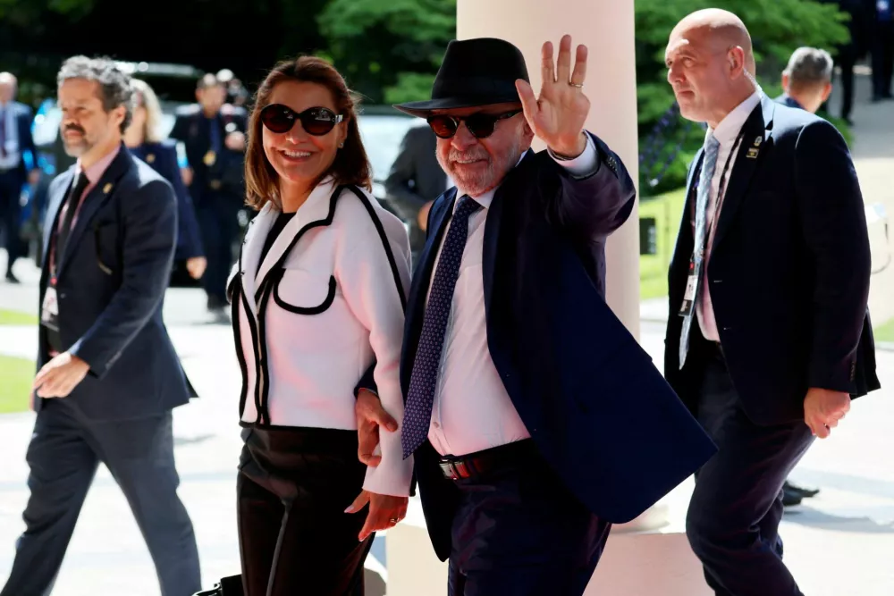 Brazil's President Luiz Inacio Lula da Silva and his wife, Rosangela "Janja" da Silva arrive at the Hotel Royal ahead of the start of the G7 summit, in Evian, France, June 15, 2026. LUDOVIC MARIN/Pool via REUTERS   TPX IMAGES OF THE DAY