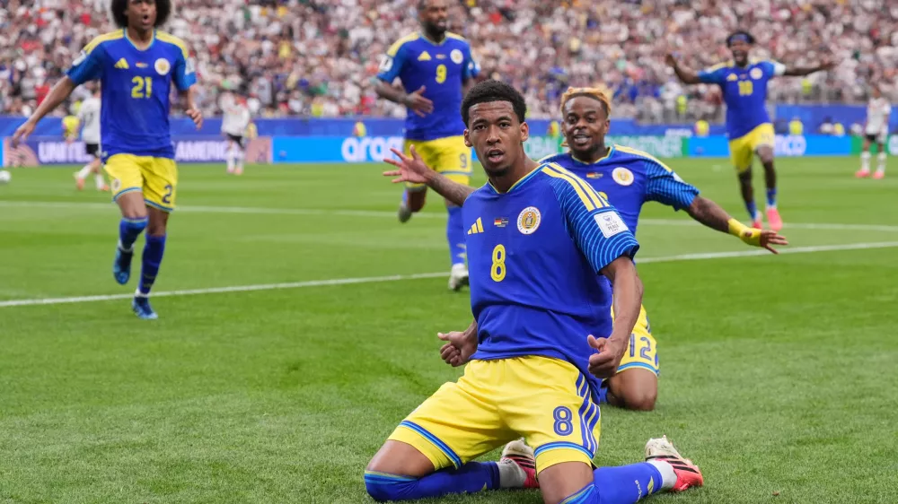 Cura&ccedil;ao's Livano Comenencia celebrates after scoring during the World Cup Group E soccer match between Germany and Curacao in Houston, Sunday, June 14, 2026. (AP Photo/Eric Gay)