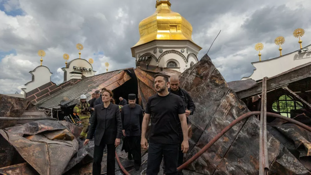 Ukraine's President Volodymyr Zelenskiy and Ukrainian Prime Minister Yulia Svyrydenko visit the Dormition Cathedral of the Kyiv Pechersk Lavra, which was hit during Russian missile and drone strikes, amid Russia's attack on Ukraine, in Kyiv, Ukraine June 15, 2026. Ukrainian Presidential Press Service/Handout via REUTERS ATTENTION EDITORS - THIS IMAGE HAS BEEN SUPPLIED BY A THIRD PARTY.    TPX IMAGES OF THE DAY
