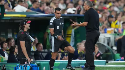 Tunisia head coach Sabri Lamouchi, right, reacts during the World Cup Group F soccer match between Sweden and Tunisia in Guadalupe, near Monterrey, Mexico, Sunday, June 14, 2026. (AP Photo/Moises Castillo)