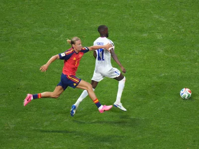 Spain's Marcos Llorente (5) grabs Cape Verde's Willy Semedo (17) during the World Cup Group H soccer match between Spain and Cape Verde in Atlanta, Monday, June 15, 2026. (AP Photo/Jacob Kupferman)