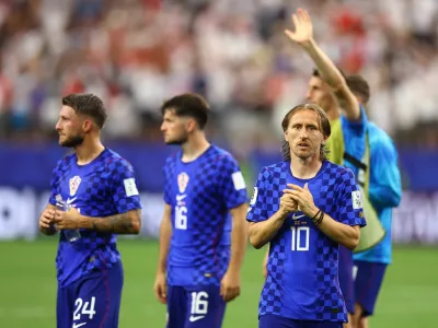 Soccer Football - FIFA World Cup 2026 - Group L - England v Croatia - Dallas Stadium, Arlington, Texas, U.S. - June 17, 2026 Croatia's Luka Modric and Marco Pasalic look dejected after the match REUTERS/Hannah Mckay