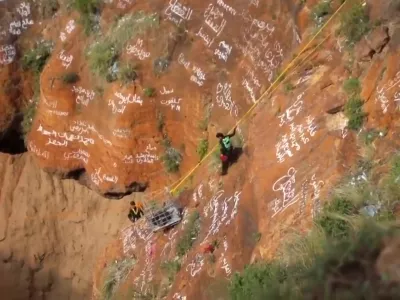 This screengrab from video, released by Yemeni Civil Defense Authority, shows rescuers removing the body of daredevil adventurer Al-Qaqa Ibn Antar on Saturday, June 13, 2026, after he had fallen into a volcanic crater in southern Yemen while climbing without safety equipment on Friday. (Yemeni Civil Defense Authority via AP)