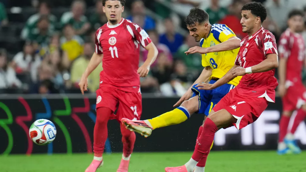 Sweden's Yasin Ayari (18) scores his team's fifth goal during the World Cup Group F soccer match between Sweden and Tunisia in Guadalupe, near Monterrey, Mexico, Sunday, June 14, 2026. (AP Photo/Matias Delacroix)