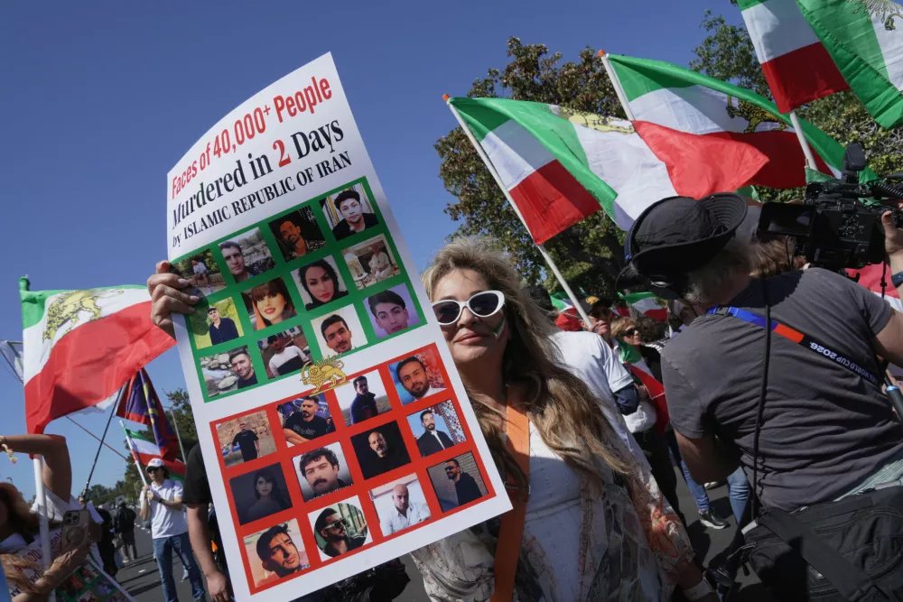 People protest outside Los Angeles Stadium before the World Cup Group G soccer match between Iran and New Zealand in Inglewood, Calif., near Los Angeles, Monday, June 15, 2026 (AP Photo/Ty ONeil)