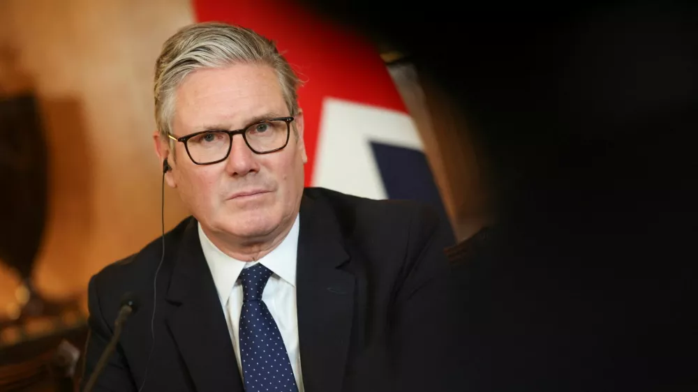 Britain's Prime Minister Keir Starmer and Japan's Prime Minister Sanae Takaichi (not pictured) attend a business roundtable meeting in Downing Street in London, Britain, June 14, 2026. REUTERS/Toby Shepheard/Pool
