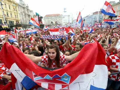 Soccer Football - World Cup - The Croatia team return from the World Cup in Russia - Zagreb, Croatia - July 16, 2018  Croatia fans await the arrival of the team at the main square in Zagreb  REUTERS/Antonio Bronic