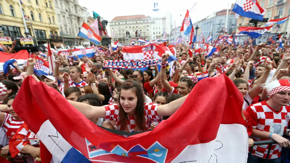 Soccer Football - World Cup - The Croatia team return from the World Cup in Russia - Zagreb, Croatia - July 16, 2018  Croatia fans await the arrival of the team at the main square in Zagreb  REUTERS/Antonio Bronic