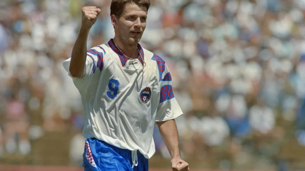 Russian forward Oleg Salenko celebrates after scoring his fourth goal against Cameroon during a World Cup match on June 28, 1994 in Stanford Stadium, in San Francisco. Salenko scored a record five goals in Russia 6-1 victory. The 15th FIFA World Cup took place in 1994. The United States hosted the event, which was held at nine locations nationwide from June 17 to July 17, 1994. Despite soccer's relative lack of popularity in the host country, the United States was selected, and the competition was the most profitable in World Cup history.,Image: 1044373445, License: Rights-managed, Restrictions:, Model Release: no 