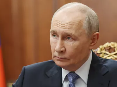 Russian President Vladimir Putin speaks with Sergei Menyailo, the North Ossetia-Alania Republic Head, during their meeting at the Kremlin in Moscow, Tuesday, June 16, 2026. (Vyacheslav Prokofyev, Sputnik, Kremlin Pool Photo via AP)