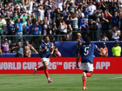 Soccer Football - FIFA World Cup 2026 - Group I - France v Senegal - New York/New Jersey Stadium, East Rutherford, New Jersey, U.S. - June 16, 2026 France's Kylian Mbappe celebrates scoring their third goal with Jules Kounde REUTERS/John Sibley
