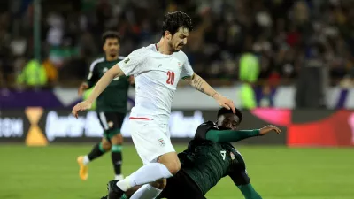 FILE PHOTO: Soccer Football - World Cup - AFC Qualifiers - Third Round - Group A - Iran v United Arab Emirates - Azadi Sports Complex, Tehran, Iran - March 20, 2025 Iran's Sardar Azmoun in action with United Arab Emirates' Kouame Kouadio Majid Asgaripour/WANA (West Asia News Agency) via REUTERS  ATTENTION EDITORS - THIS IMAGE HAS BEEN SUPPLIED BY A THIRD PARTY./File Photo