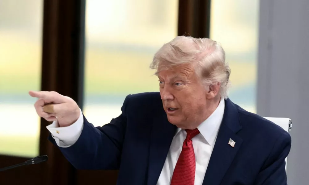 U.S. President Donald Trump gestures as he attends a working session with G7 leaders and outreach partners on promoting economic growth during the G7 Summit in Evian-les-Bains, France, June 17, 2026. REUTERS/Evelyn Hockstein