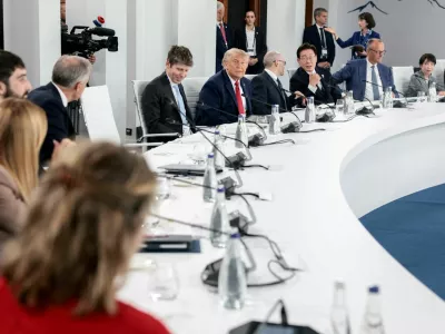 U.S. President Donald Trump, OpenAI CEO Sam Altman, Google DeepMind CEO Demis Hassabis, South Korea's President Lee Jae Myung, Germany's Chancellor Friedrich Merz and Japan's Prime Minister Sanae Takaichi attend a working lunch with G7 leaders, G7 outreach partners and global tech CEOs on innovation and AI during the G7 Summit in Evian-les-Bains, France, June 17, 2026.REUTERS/Evelyn Hockstein REFILE - ADDING INFORMATION