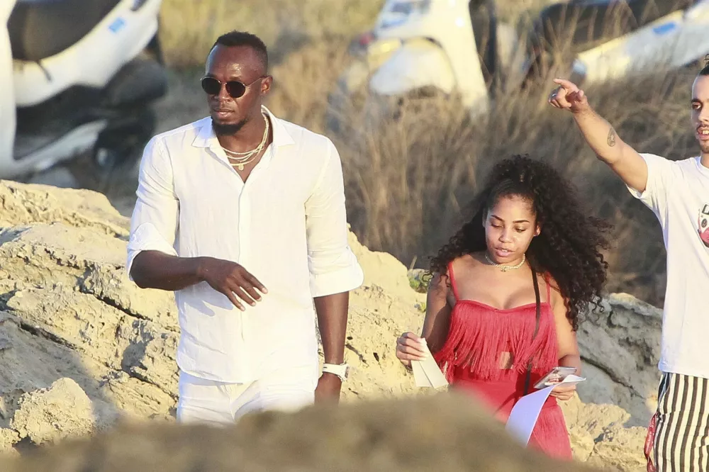FORMENTERA, SPAIN - Jamaican retired sprinter Usain Bolt and his long time girlfriend Kasi J. Bennett pictured enjoying holidays in Formentera.BACKGRID UK 15 AUGUST 2019,Image: 465614714, License: Rights-managed, Restrictions: RIGHTS: WORLDWIDE EXCEPT IN ITALY, Model Release: no, Pictured: Usain Bolt, Kasi J. Bennett / Foto: Frco Via Profimedia