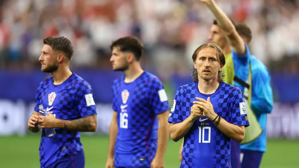 Soccer Football - FIFA World Cup 2026 - Group L - England v Croatia - Dallas Stadium, Arlington, Texas, U.S. - June 17, 2026 Croatia's Luka Modric and Marco Pasalic look dejected after the match REUTERS/Hannah Mckay