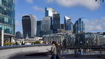 11 September 2024, United Kingdom, London: People walk near Tower Bridge past the City of London skyline, the capital's financial district, as the Office for National Statistics (ONS) reports that the UK economy unexpectedly flatlined in July for the second consecutive month. Photo: Vuk Valcic/ZUMA Press Wire/dpa