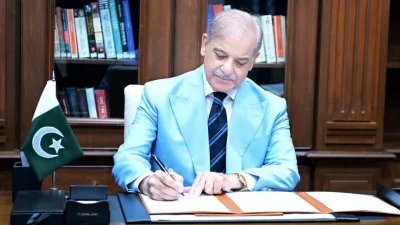 Pakistan's Prime Minister Shehbaz Sharif signed Islamabad Memorandum of Understanding (Islamabad MoU) as mediator, after it was signed by U.S. President Donald J. Trump and Iranian President Masoud Pezeshkian, at his office in Islamabad, Pakistan, June 18, 2026. Press Information Department (PID)/Handout via REUTERS ATTENTION EDITORS - THIS PICTURE WAS PROVIDED BY A THIRD PARTY. BEST QUALITY AVAILABLE.    TPX IMAGES OF THE DAY