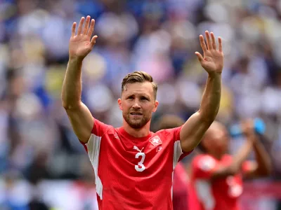 Soccer Football - FIFA World Cup 2026 - Group B - Switzerland v Bosnia and Herzegovina - Los Angeles Stadium, Inglewood, California, U.S. - June 18, 2026 Switzerland's Silvan Widmer celebrates after the match IMAGN IMAGES via Reuters/Gary Vasquez