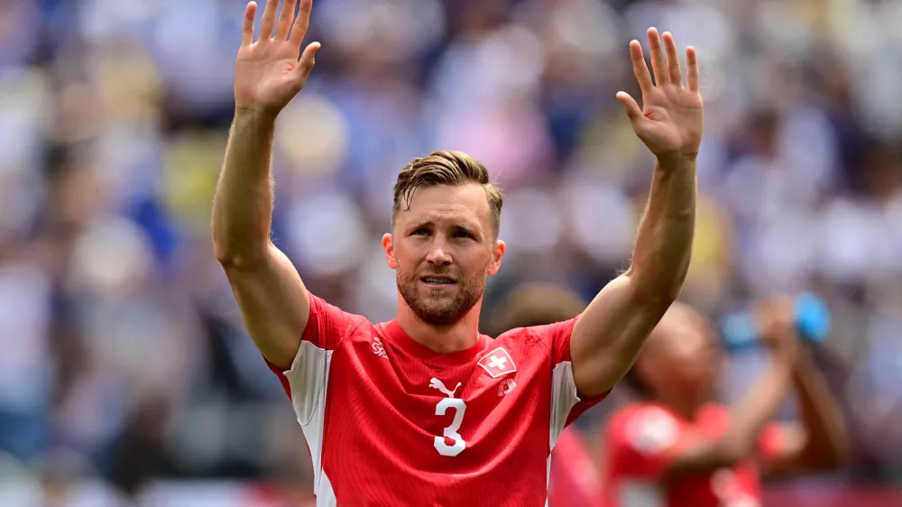 Soccer Football - FIFA World Cup 2026 - Group B - Switzerland v Bosnia and Herzegovina - Los Angeles Stadium, Inglewood, California, U.S. - June 18, 2026 Switzerland's Silvan Widmer celebrates after the match IMAGN IMAGES via Reuters/Gary Vasquez