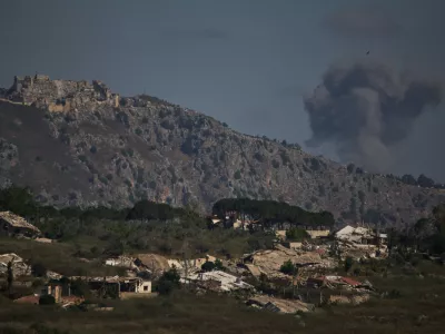 Smoke rises to the sky in an area near Beaufort Castle following an Israeli military strike in southern Lebanon as seen from northern Israel, Friday, June 19, 2026. (AP Photo/Leo Correa)