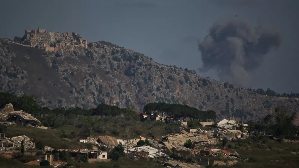 Smoke rises to the sky in an area near Beaufort Castle following an Israeli military strike in southern Lebanon as seen from northern Israel, Friday, June 19, 2026. (AP Photo/Leo Correa)