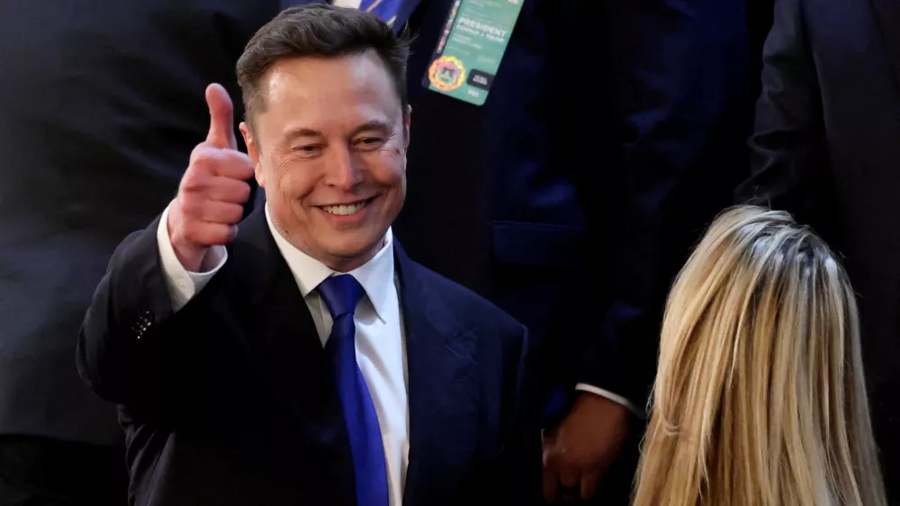 FILE PHOTO: Elon Musk gestures in the gallery on the day of U.S. President Donald Trump's speech to a joint session of Congress, in the House Chamber of the U.S. Capitol in Washington, D.C., U.S., March 4, 2025. REUTERS/Kevin Lamarque/File Photo