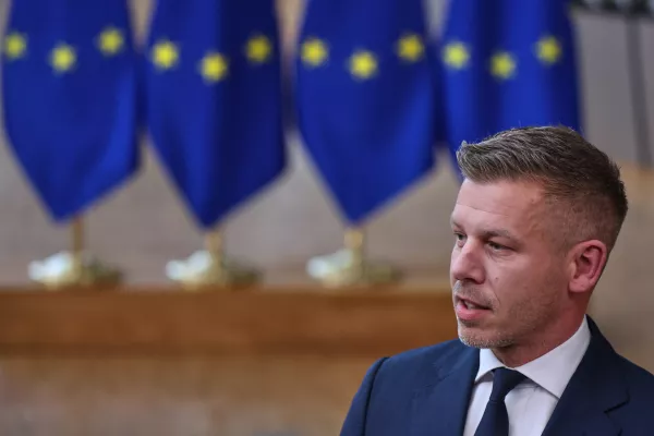 Hungary's Prime Minister Peter Magyar talks to journalists as he arrives for the EU summit in Brussels, Thursday, June 18, 2026. (AP Photo/Omar Havana)