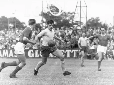 Johann (Hans) Buzek (center) in the football match First Vienna FC against Vasas (Hungary). Hohe Warte. Vienna 19. 3 July 1960. Photograph.,Image: 706504746, License: Rights-managed, Restrictions: no model release, Model Release: no 