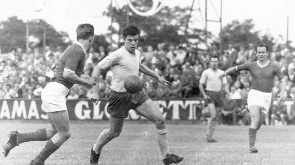 Johann (Hans) Buzek (center) in the football match First Vienna FC against Vasas (Hungary). Hohe Warte. Vienna 19. 3 July 1960. Photograph.,Image: 706504746, License: Rights-managed, Restrictions: no model release, Model Release: no 