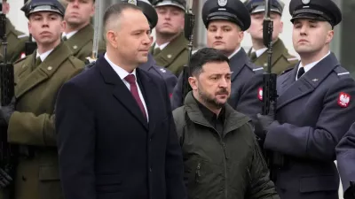 FILE - Polish President Karol Nawrocki, left, and Ukrainian President Volodymyr Zelenskyy attend an official welcome ceremony before their meeting at the Presidential Palace in Warsaw, Poland, Dec. 19, 2025. (AP Photo/Czarek Sokolowski, File)