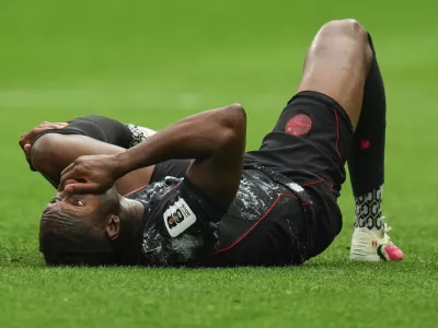 Canada's Ismael Kone reacts on the ground after sustaining an injury during the World Cup Group B soccer match against Qatar in Vancouver, British Columbia, Thursday, June 18, 2026. (AP Photo/Abbie Parr)
