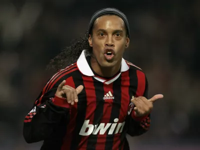 AC Milan's Ronaldinho celebrates after scoring against Real Madrid during their Champions League soccer match at the San Siro stadium in Milan November 3, 2009. REUTERS/Alessandro Garofalo (ITALY SPORT SOCCER)