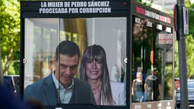 FILE PHOTO: A truck displaying images of Spanish Prime Minister Pedro Sanchez and his wife Begona Gomez drives outside the court as a way of protest on the day Gomez appears in court to testify as part of influence-peddling investigation, in Madrid, Spain, June 15, 2026. REUTERS/Ana Beltran/File Photo