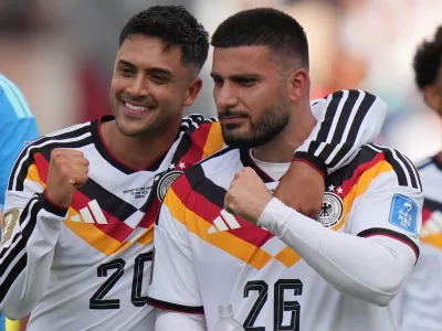 Germany's Nadiem Amiri, left and teammate Germany's Deniz Undav react after the World Cup Group E soccer match between Germany and Ivory Coast in Toronto, Saturday, June 20, 2026. (AP Photo/Stephanie Scarbrough)