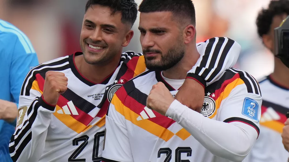 Germany's Nadiem Amiri, left and teammate Germany's Deniz Undav react after the World Cup Group E soccer match between Germany and Ivory Coast in Toronto, Saturday, June 20, 2026. (AP Photo/Stephanie Scarbrough)