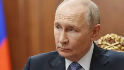Russian President Vladimir Putin speaks with Sergei Menyailo, the North Ossetia-Alania Republic Head, during their meeting at the Kremlin in Moscow, Tuesday, June 16, 2026. (Vyacheslav Prokofyev, Sputnik, Kremlin Pool Photo via AP)