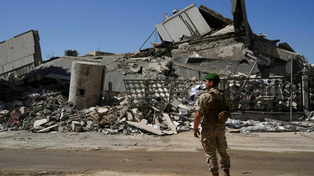 A Lebanese army soldier inspects the damage in the aftermath of an Israeli strike in Nabatieh, Lebanon June 21, 2026. REUTERS/Stringer REFILE - QUALITY REPEAT