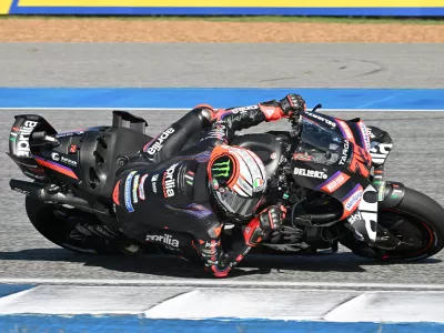 Italy's Marco Bezzecchi of Aprilia Racing steers his motorcycle during the MotoGP at the Chang International Circuit in Buriram, Thailand, Sunday, March 1, 2026. (AP Photo/Kittinun Rodsupan)