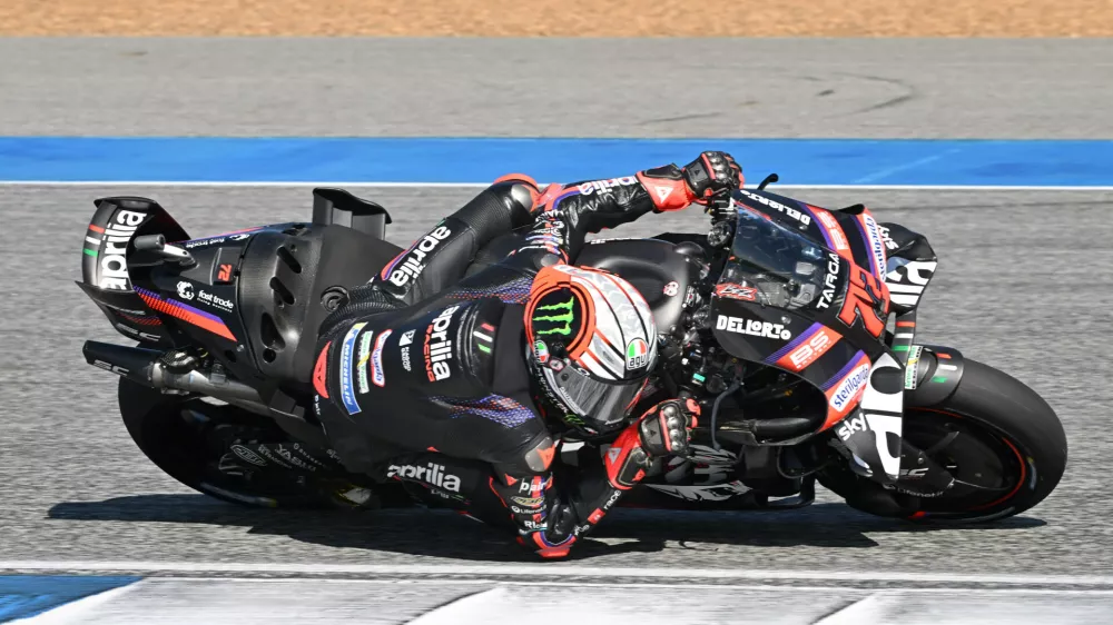 Italy's Marco Bezzecchi of Aprilia Racing steers his motorcycle during the MotoGP at the Chang International Circuit in Buriram, Thailand, Sunday, March 1, 2026. (AP Photo/Kittinun Rodsupan)