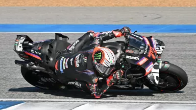 Italy's Marco Bezzecchi of Aprilia Racing steers his motorcycle during the MotoGP at the Chang International Circuit in Buriram, Thailand, Sunday, March 1, 2026. (AP Photo/Kittinun Rodsupan)